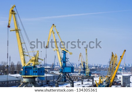 Port cranes in the industrial area of Kiev
