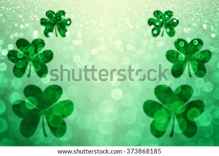 Abstract lucky green Irish St Patricks Day Shamrock glitter sparkle background or party invite