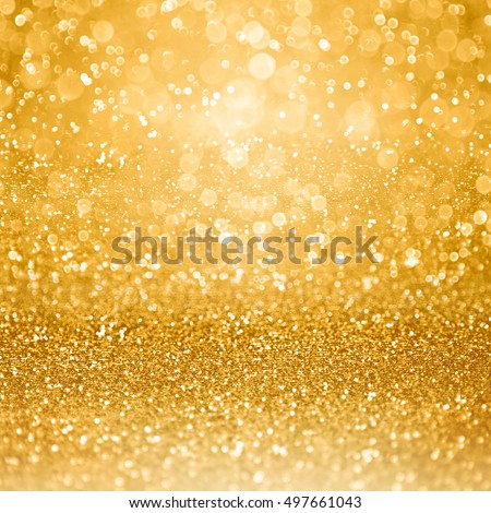 Abstract glamorous gold glitter sparkle confetti background or glitzy glam luxury golden color party invite for birthday, anniversary, wedding, new year’s eve or Christmas