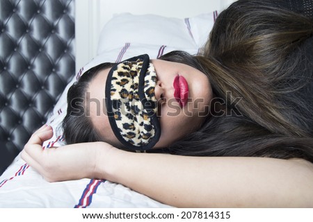 Young woman getting her beauty sleep (portrait, sleeping beauty)