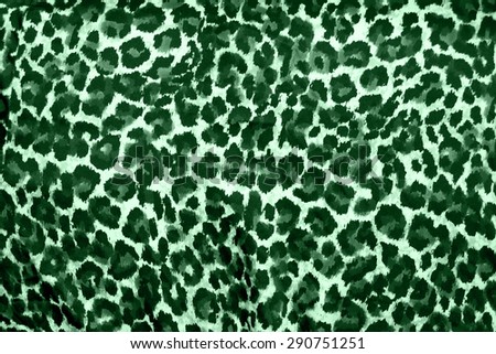 Beautiful green leopard animal print background / wallpaper (safari wildlife)