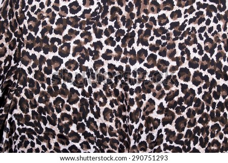 Beautiful brown leopard animal print background / wallpaper (safari wildlife)