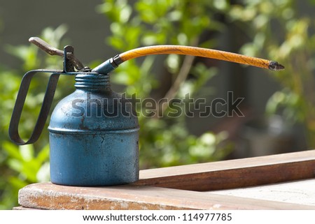 Oil Gun on the backyard background