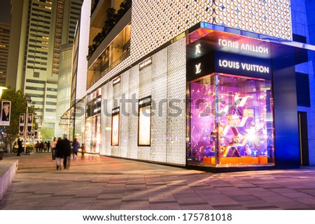 Shanghai - DEC 24: Louis Vuitton store at Plaza 66 Shopping Center at Nanjing West Road on Dec 24, 2013 in Shanghai, China. Now, there are many Louis Vuitton stores in Shanghai\'s shopping districts.