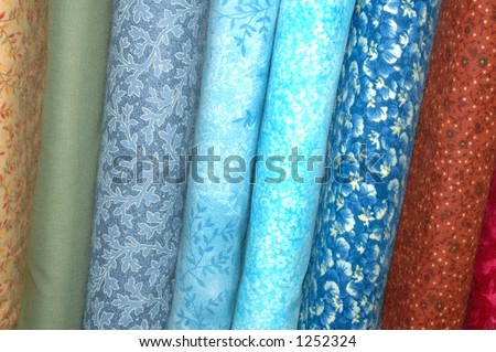 Quilting fabrics in bolts in the blue spectrum.