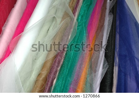 Bolts of tule fabric.
