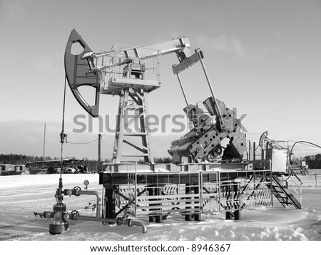 Oil extraction. Oil industry. Construction and mechanism in work.