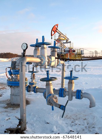 Oil extraction. Oil industry. Construction and mechanism in work.