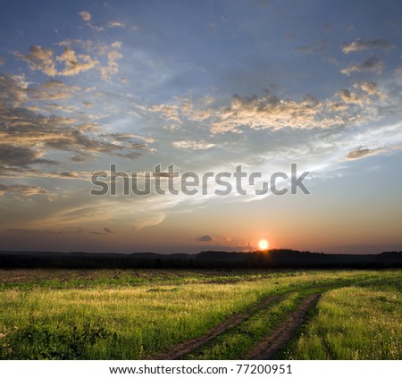 Beautiful sunset above rural lane. Square composition