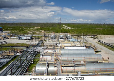 Oil ndustry and gas industry. Work of refinery petrochemical plant. Oil reservoir and storage tank. Gas station