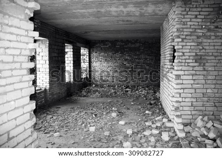 Inside of destroyed house. Ruins. Black and white photo