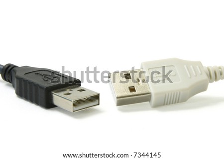Black and white USB leads on white background