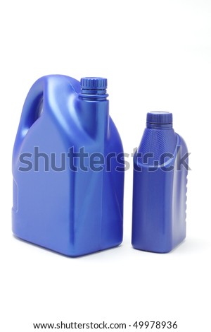 Plastic containers of lubrication oil on white background