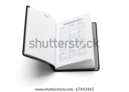 2011 Calendar Diary. stock photo : Pocket diary showing 2011 calendar on white background