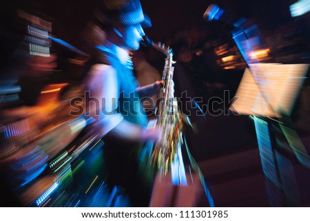 Saxophone Player Performing On Stage