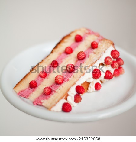 Layer- cake was prepared with sponge cake, wild strawberry cream, whipped -cream and wild strawberry Between layers put wild strawberry cream. On the top layer is whipped - cream and wild strawberries