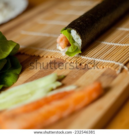 Sushi prepared with rice, raw tune, raw salmon, wasabi sauce, majo, soya sauce, prawn and avocado, lettuce rice . You can find it at japanese restaurant. Japan, japanese food, Asia
