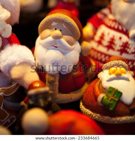 Santa Clause statuette. Christmas decoration selling during Christmas market. Macro, background, postcard. Nobody. Christmas preparation, boxing day, gift.
