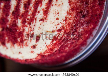 Red velvet cake has bright red, dark red or red- brown color. Prepared as a layer cake with icing or cheese topping. Ingredients:butter milk, butter, cocoa, flour