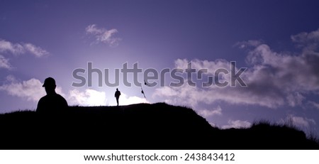 Man on a Scottish hill- Arthur Seat. Landscape view. Scottisch landscape. sunset, view, tourism, traveling, walking.