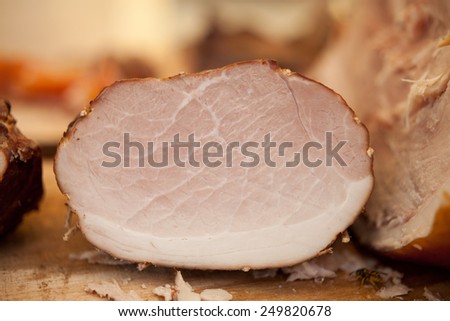 Home-made boiled ham prepared by polish butcher. Macro perspective. Organic food, Nobody. Sell during fair, markets, in a butchery shops. Butchery.