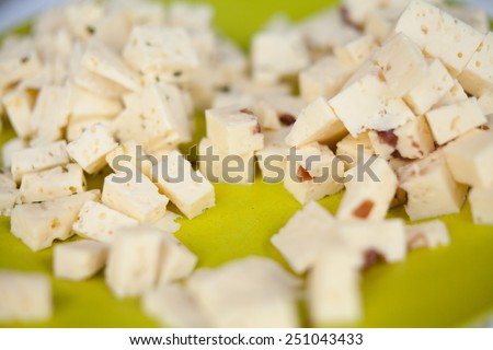 Cheese cut into dices. Typical snack in  Europe. Fresh, organic food.  Nobody. Italy, Spain, Greece.
