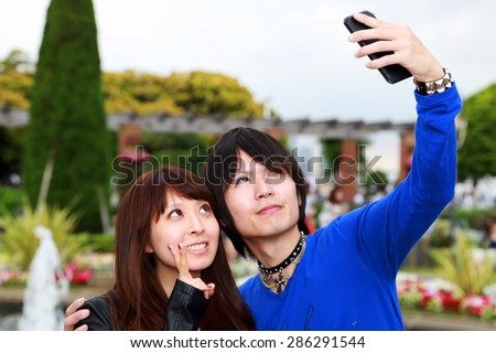 Man and woman takes the photograph