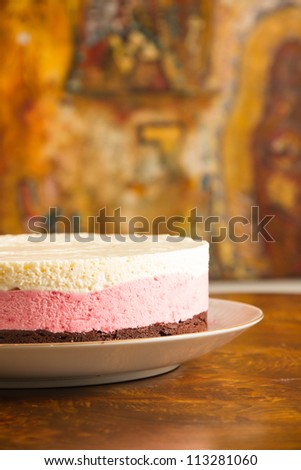 Detail of chocolate mousse cake and strawberry