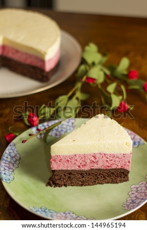 Chocolate mousse cake and strawberries with remaining cake background