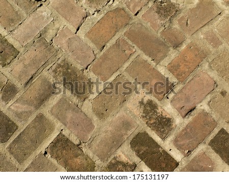 Brick floor of an old street, weathered by template climate. Texture, Nobody.