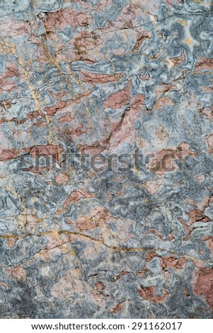 Texture of coloured marble. Colors, blue, red, brown, gold, yellow. Elegant old stone.