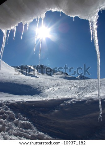 Spring in mountain :     This ice seems resist at this hot weather , just wonderful  blue sky in mountain.   Massif Of Thabor