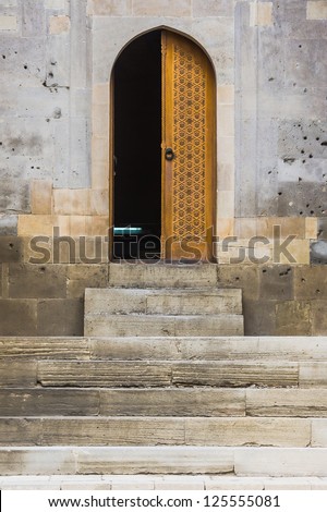 Simple Islamic style half open doorway in Shirvanshah\'s Palace, famous historical landmark of Baku, Azerbaijan