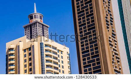 DUBAI, UAE - FEBRUARY 3: Stunning examples of architectural styles in Dubai downtown, UAE, on February 03, 2013. Dubai has a rich collection of amazing buildings and structures of various styles.