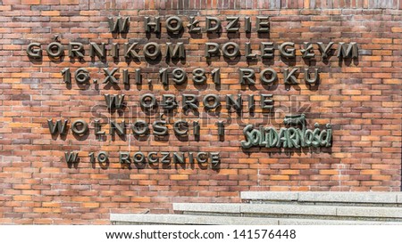 KATOWICE, POLAND - JUNE 09: The inscription commemorating the miners of Wujek Coal Mine fallen during the pacification of the strike against the martial law in December 1981. Taken on June 09, 2013.
