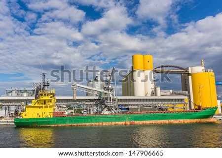 GDANSK, POLAND - JULY 11: Ship at the bulk terminal on July 11, 2013 in the Port of Gdansk, the largest seaport in Poland, major transportation hub in the central part of the southern Baltic Sea coast