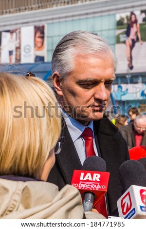 WARSAW, POLAND - MARCH 28, 2014: Jaroslaw Gowin, leader of the right-wing party Polska Razem (Poland Together) interviewed on the street during the election campaign for the European Parliament.