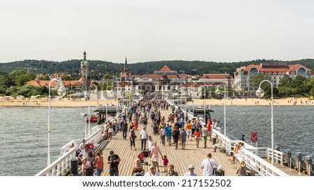 SOPOT, POLAND - AUGUST 06, 2014:  Skyline of Sopot taken out of the wooden pier. The pier built in 1827 at 511 m remains the longest wooden pier in Europe and is the main attraction of the resort.
