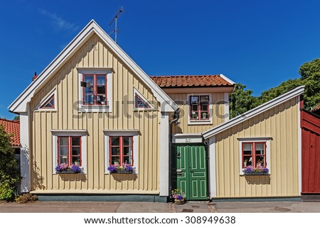KALMAR, SWEDEN - AUGUST 9, 2015: Small residential houses in Kalmar, city situated by the Baltic Sea with around 36k inhabitants, the seat of Kalmar Municipality and the capital of Kalmar County.