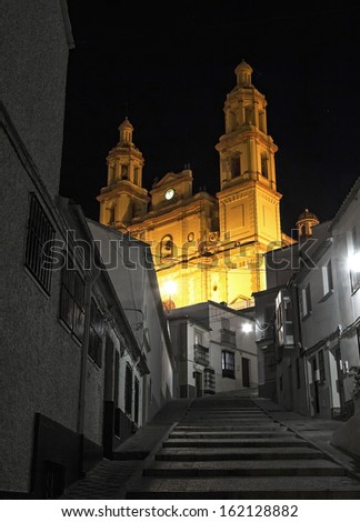 Night view of the Church of Olvera (Parish of Our Lady of the Incarnation) one of the white villages of Cadiz, Andalusia, Spain