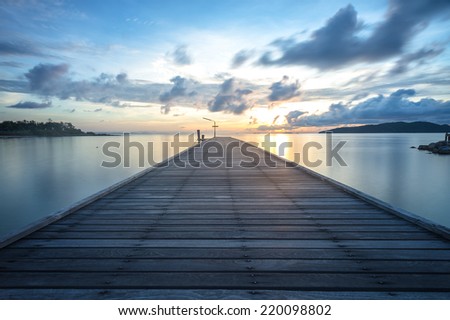 The wood bridge in the morning sunrise