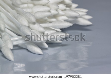 the cotton buds on paper background