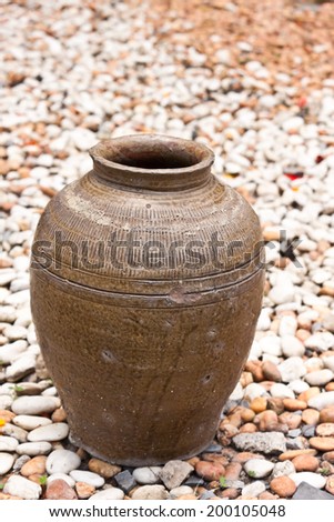 the old jar with rock background
