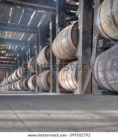 Whiskey barrels aging in barrel house in Kentucky