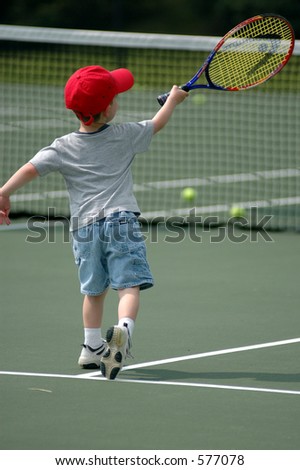 Toddler Hitting Forehand Tennis Shot