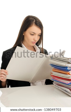 Business woman working under stressful conditions at work