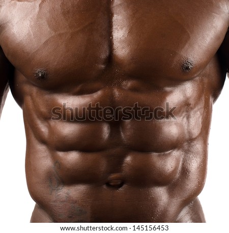 Close up on perfect abs. Strong bodybuilder with six pack.
