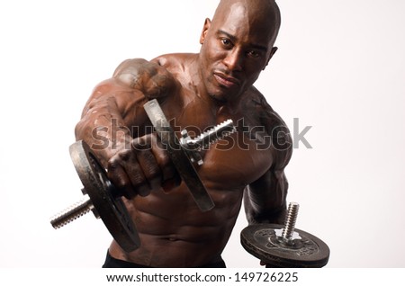 Black bodybuilder training with dumbbells. Strong man with perfect abs, pecs shoulders,biceps, triceps and chest. Isolated on white background
