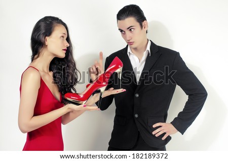 Woman happy for her red shoes, woman in love with shopping and asking her boyfriend for permission to buy more shoes
