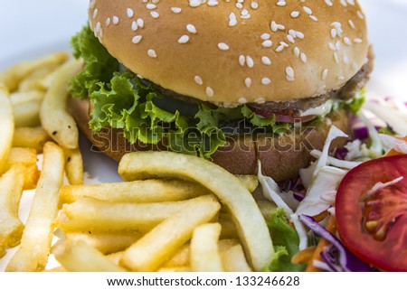 burger,french fries and salad.